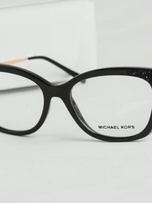 Chic black cat eye eyeglasses by Michael Kors with luxurious design accents.