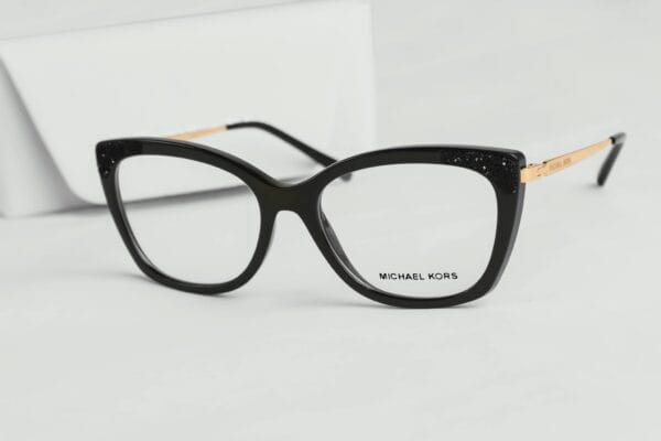 Chic black cat eye eyeglasses by Michael Kors with luxurious design accents.